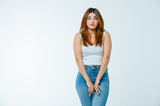 Woman experiencing discomfort from a urinary tract infection